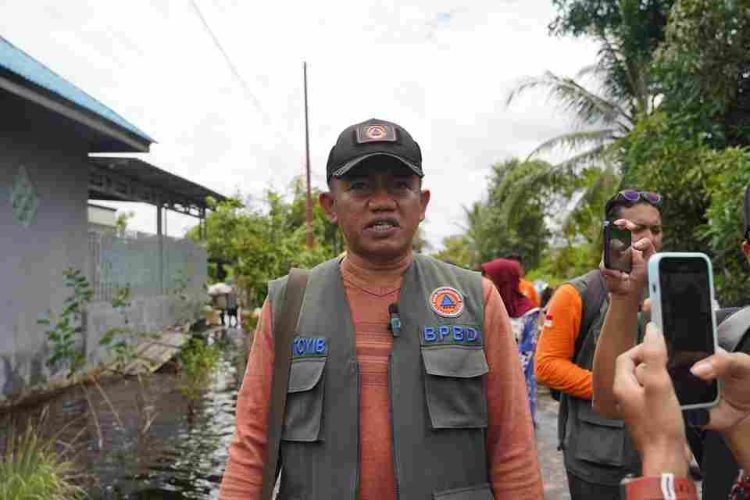 Kalaksa BPBD Dampingi Ketua TP-PKK Tinjau Lokasi Banjir