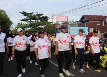 Wakil Ketua I DPRD Kapuas Semarakkan Jalan Sehat Hari Bhayangkara ke-79
